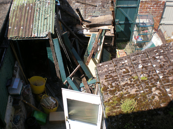 The shed comes down
